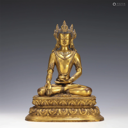 A BRONZE GILT SEATED CROWN BUDDHA