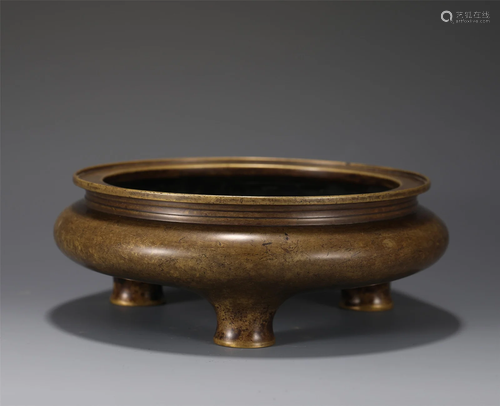 A BRONZE TRIPOD CENSER