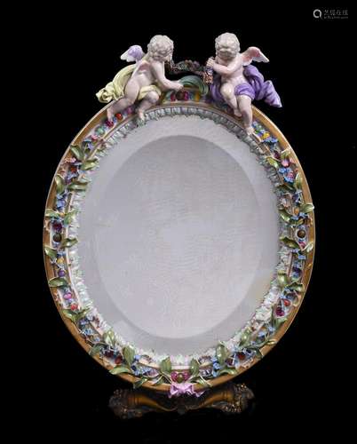 A Meissen flower encrusted and gilt metal mounted oval strut...