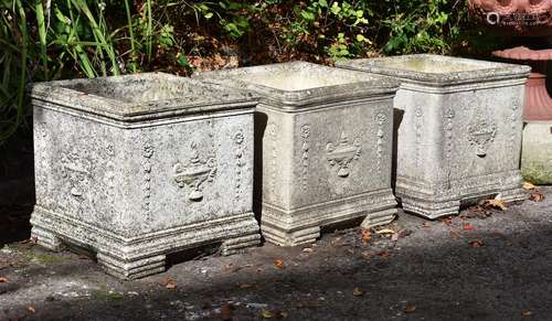 A set of three composition stone planters