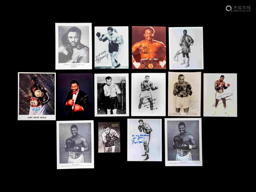 A Group of 14 Heavyweight Boxing Champion Signed