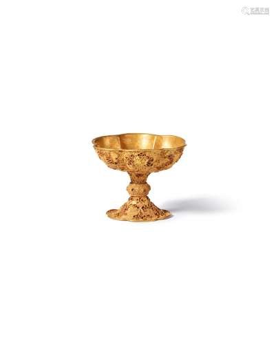 A gold-repoussé foliate stem cup