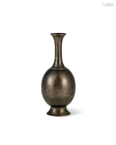 A small bronze vase