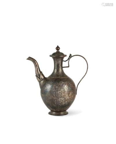 A bronze ewer and cover