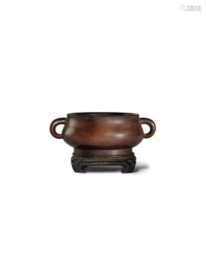 A bronze incense burner