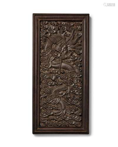 A zitan carved 'dragon' panel
