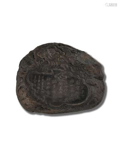 A carved 'clouds' Duan inkstone