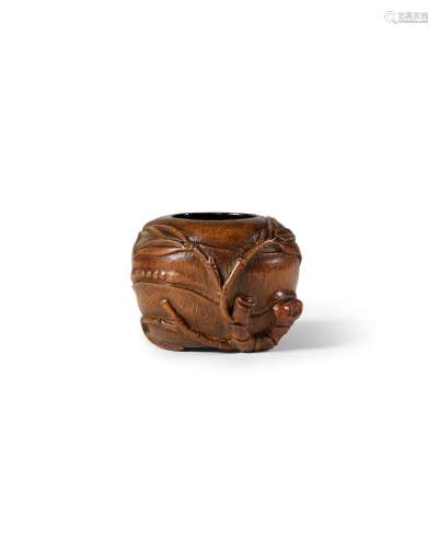 A carved bamboo root waterpot