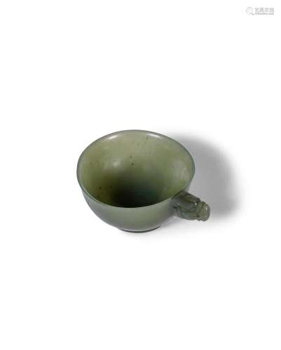 A small green jade 'dragon' cup