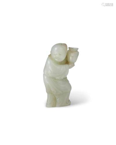 A pale green jade figure of a boy holding a vase