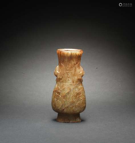 A PALE GREEN JADE ARCHAISTIC VASE, HU