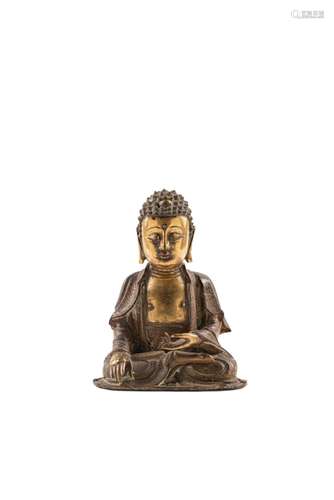 A PARCEL-GILT BRONZE FIGURE OF BUDDHA