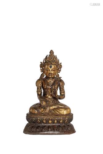 A LARGE PARCEL-GILT COPPER-ALLOY REPOUSSÉ FIGURE OF MAI...