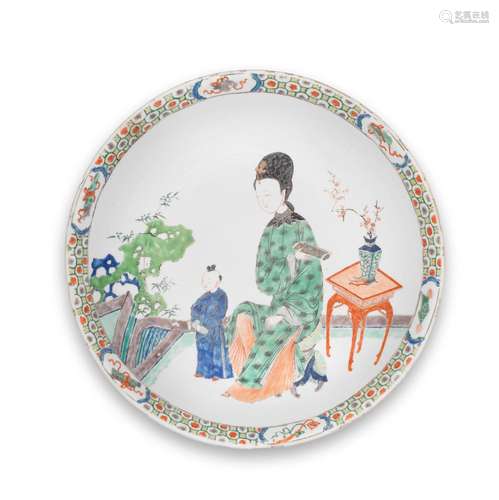 A famille verte 'Lady and boy' saucer-dish