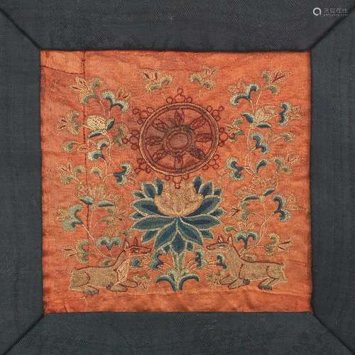 A RARE CORAL-GROUND SILK EMBROIDERED 'BUDDHIST WHEEL AND DEE...