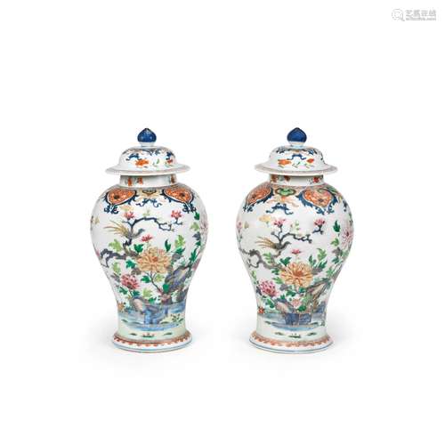 A pair of famille rose baluster vases and covers