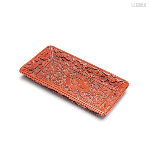 A RARE CINNABAR LACQUER CARVED 'DRAGON' TRAY