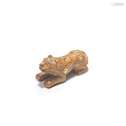 A PRECIOUS-STONE-INLAID JASAILMER-STONE CARVING OF A TIGER