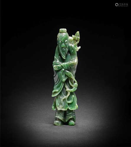 A SPINACH-GREEN JADE FIGURE OF LÜ DONGBIN