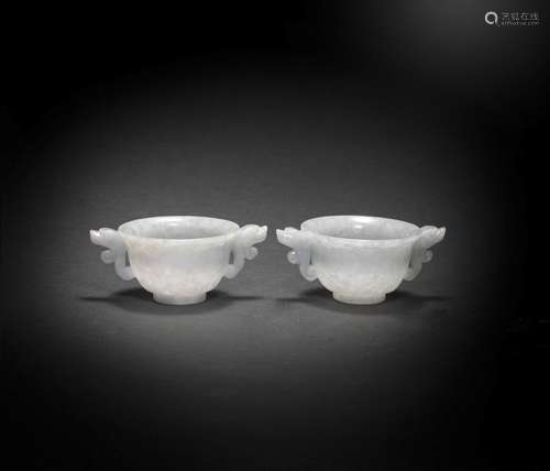 A PAIR OF JADEITE TWO-HANDLED WINE CUPS