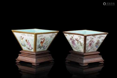 A pair of eight immortals porcelain cups, of squared shape C...