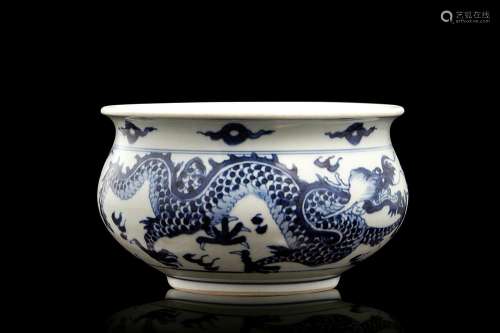 A blue and white porcelain dragon censer China, Qing dynasty...