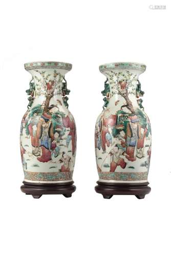 Two famille rose baluster vases, with wood stands (defects) ...