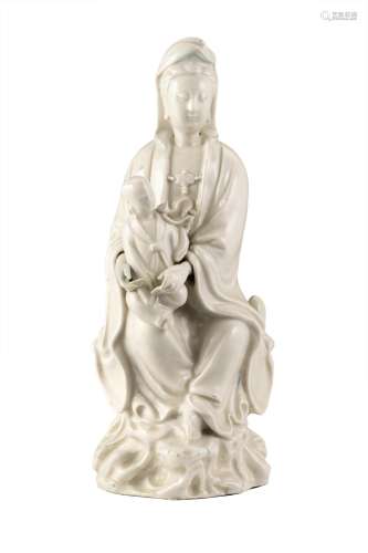 A blanc de Chine Guanyin with child (restorations) China, ea...