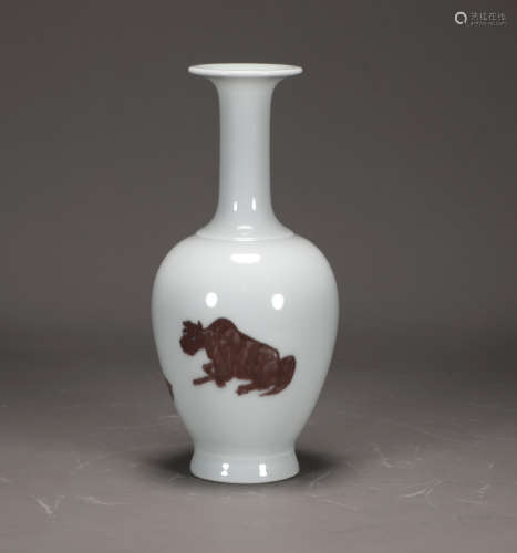 A CHINESE PORCELAIN WITH RED GLAZED BEAST DESIGN