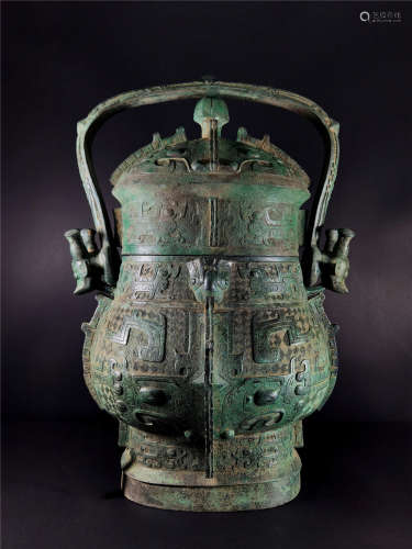 A CHINESE VINTAGE BRONZE YOU WITH A HANDLE