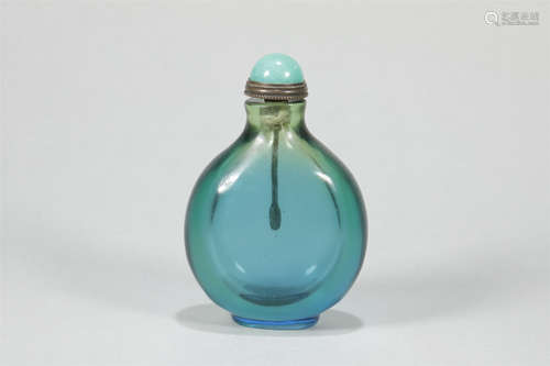 A QING DYNASTY BLUE GLASS SNUFF BOTTLE