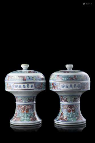 A pair of doucai porcelain altar vases "Dou", mark...
