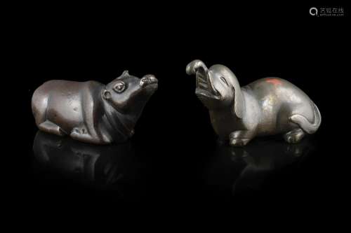A bronze elephant scroll weight, together with a bronze wate...