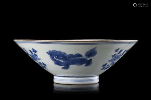 A blue and white bowl, decorated with buddhist lions and flo...