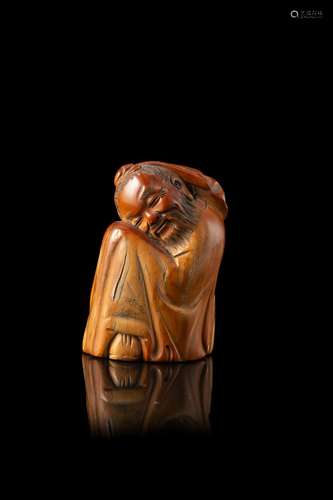 A Ming style ivory figure depicting a wise man China, 19th c...