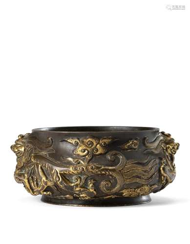 A cast bronze censer, ceselled with dragons among clouds, Xu...