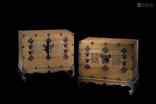 A pair of galuchat covered nuptial cabinets, each with two d...