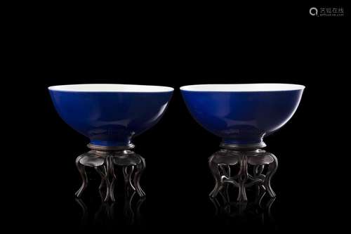 A pair of blue ground porcelain bowls, apocryphal Yongzheng ...