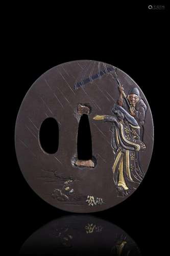 Oval bronze tsuba with gold decorations, female figure and s...