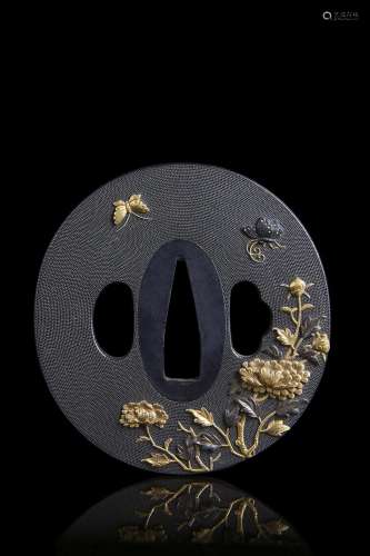 Bronze tsuba with flowers and butterflies. Edo period, end o...