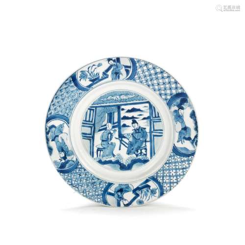 A BLUE AND WHITE FIGURAL DISH