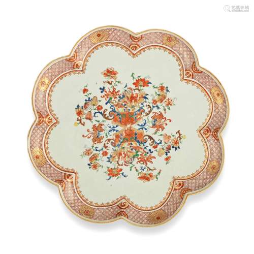 A LARGE FAMILLE ROSE AND ROUGE-DE-FER LOBED DISH