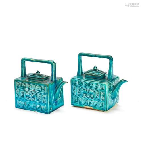 A NEAR PAIR OF TURQUOISE-GLAZED TEA KETTLES AND COVERS