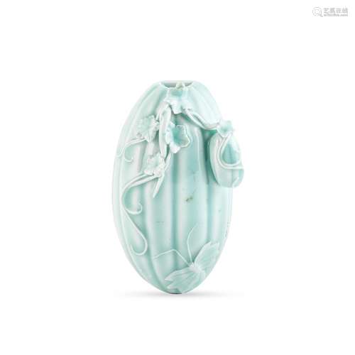 A CELADON-GLAZED 'MELONS' WALL VASE