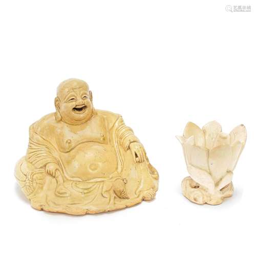 AN YIXING PALE CREAM SLIP FIGURE OF BUDAI AND A ZHANGZHOU WH...