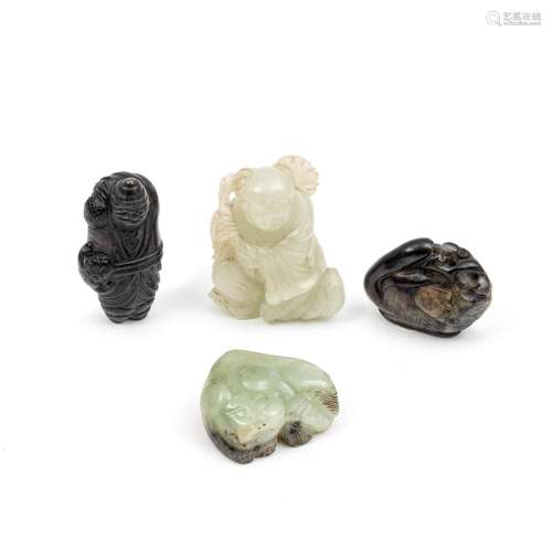 A GROUP OF TWO JADE ANIMALS AND TWO HUMAN FIGURES