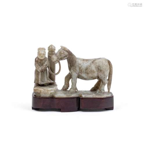 A PALE GREYISH-GREEN AND RUSSET JADE 'HORSE AND GROOM' GROUP