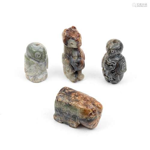 A GROUP OF FOUR ARCHAISTIC ANIMAL AND BIRD PENDANTS