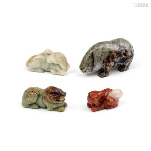 A GROUP OF THREE JADE AND ONE AGATE CARVING OF ANIMALS