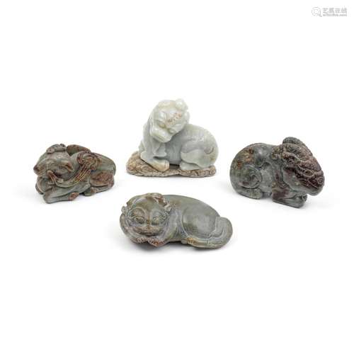 A GROUP OF FOUR LARGE JADE ANIMALS